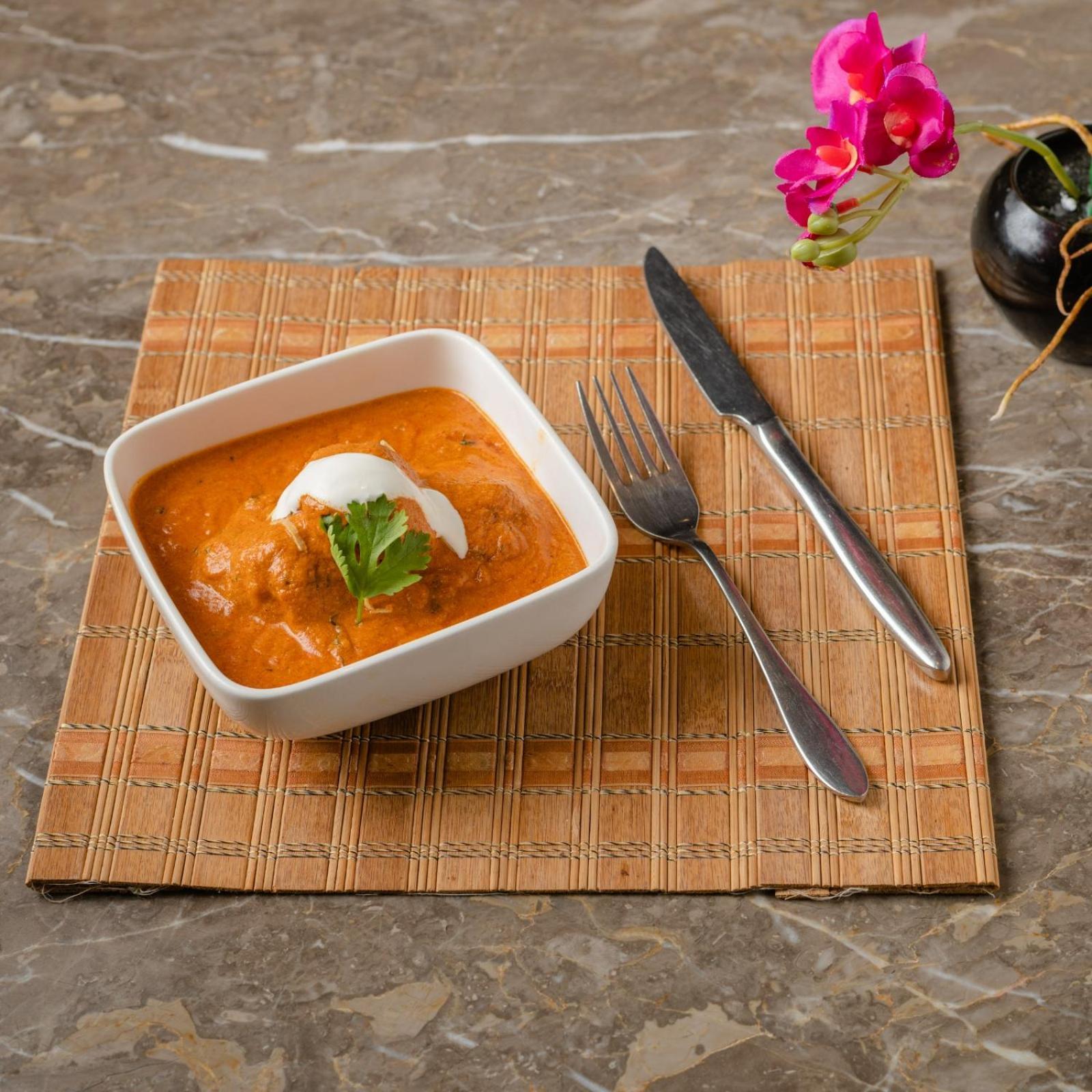 Southern Star,מייזור מראה חיצוני תמונה A bowl of butter chicken